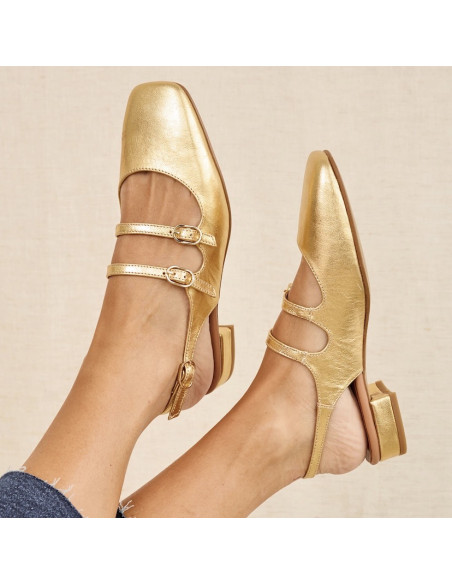 Gold Lolina backless Mary Janes, feet crossed in the air - MONPIEL