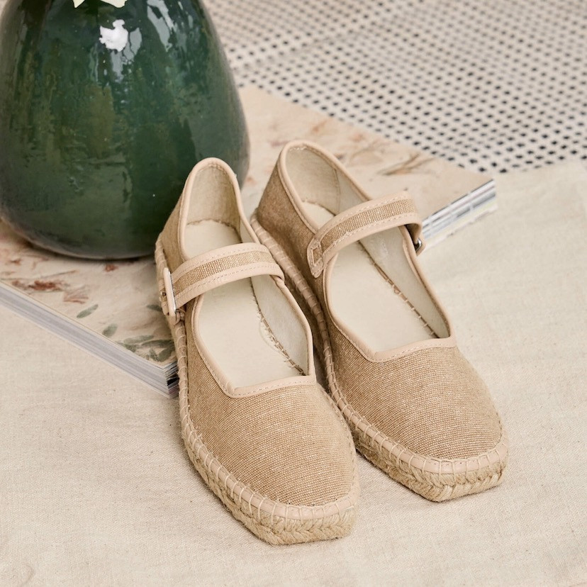 Beige shiny Cuba Mary Jane espadrille, perspective view, resting on a magazine - MONPIEL