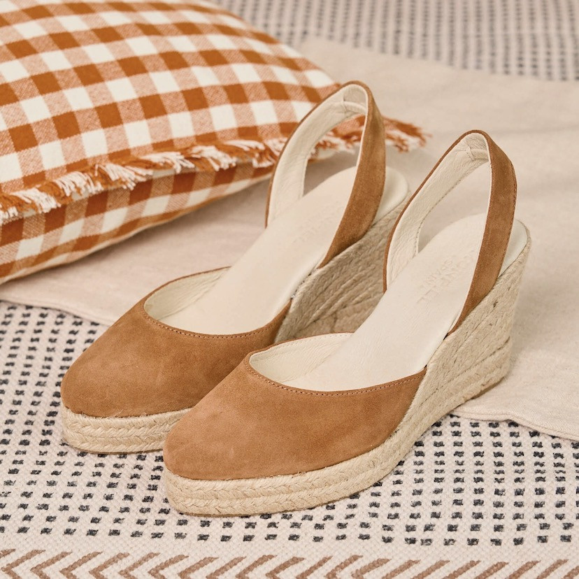 Suede leather wedge espadrille in leather color, perspective view next to a cushion - MONPIEL