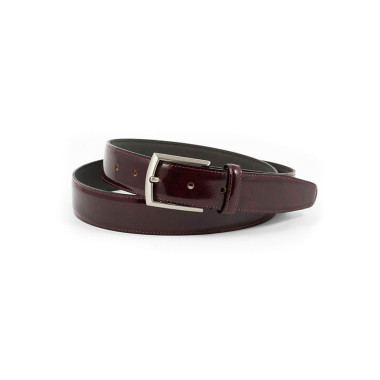 Top view of burgundy leather belt, metal buckle detail - MONPIEL 2