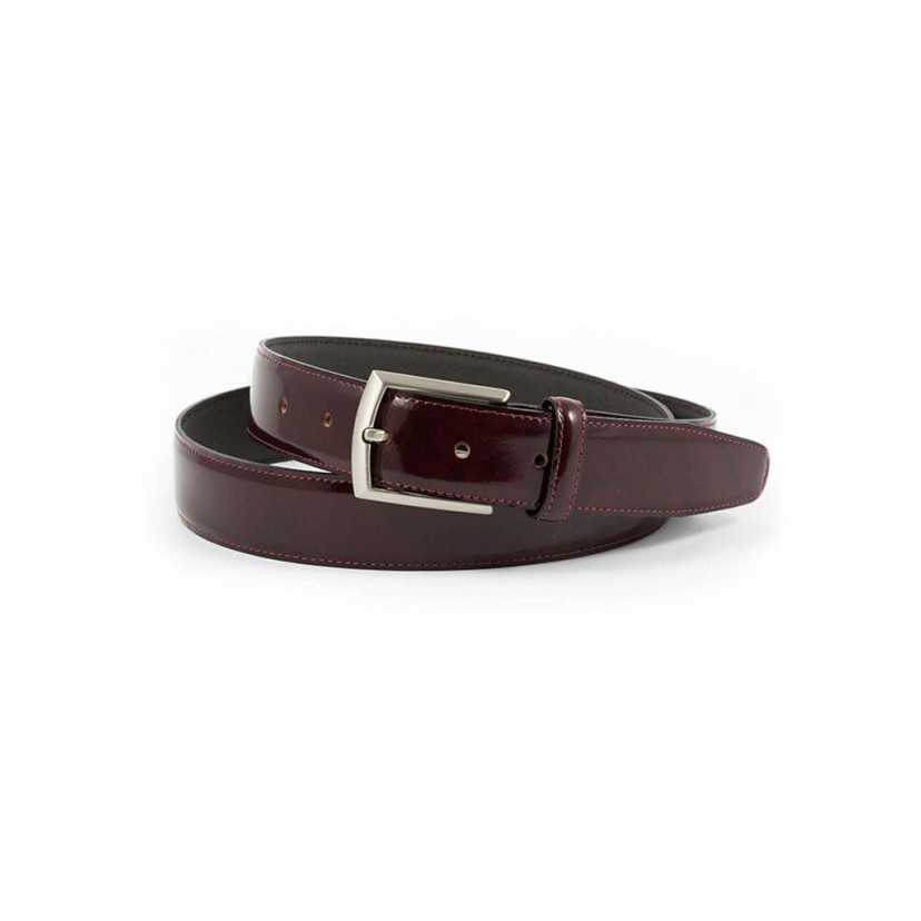 Burgundy leather belt rolled up with a rectangular metal buckle - MONPIEL