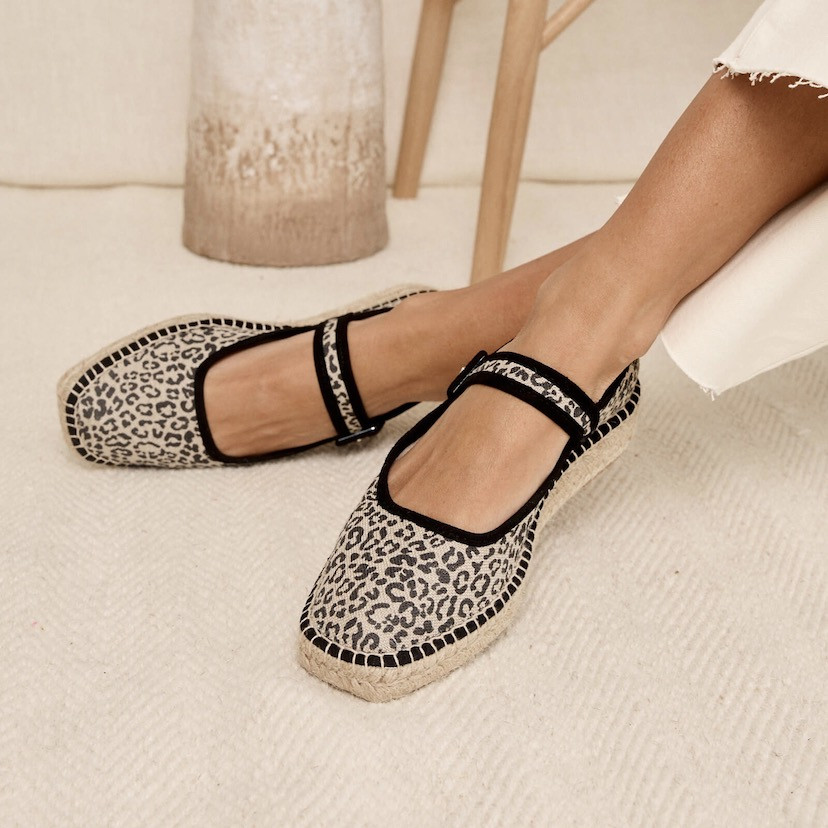 Cuba leopard print Mary Jane espadrille in black leopard canvas with crossed feet on carpet - MONPIEL