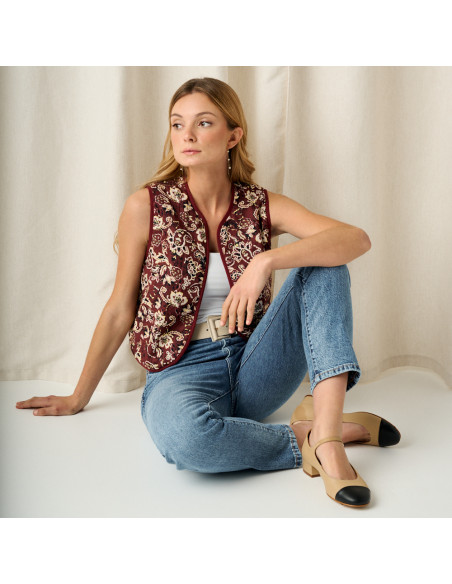 Charlotte pointed Mary Jane in beige, model seated on the floor, leg crossed over - MONPIEL