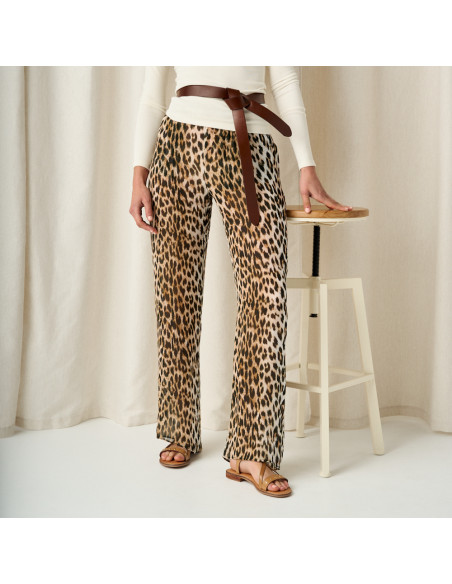 Bari studded cross strap sandal in tan color, medium shot with leather belt - MONPIEL