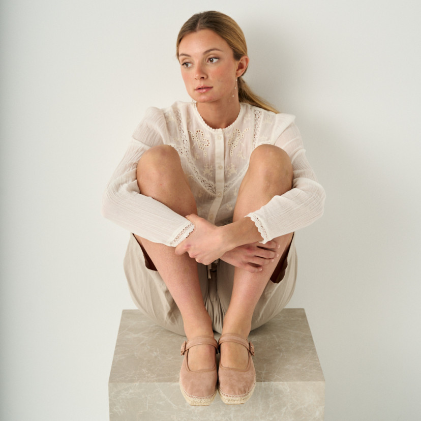 Cuba Mary Jane espadrille in pale pink with front view, model sitting on marble cube with feet resting - MONPIEL