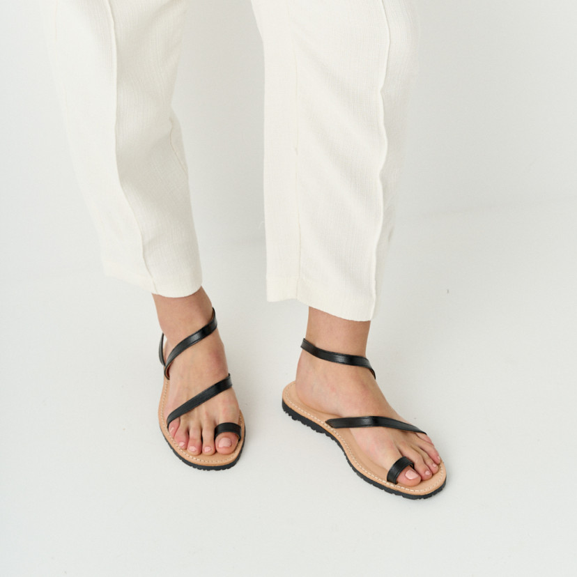 Milos leather sandal with straps in black, front and perspective view of the foot - MONPIEL