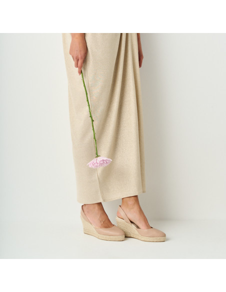 Nude leather wedge espadrille with perspective view, flower detail in hand - MONPIEL Nude leather wedge espadrille with perspective view, flower detail in hand - MONPIEL