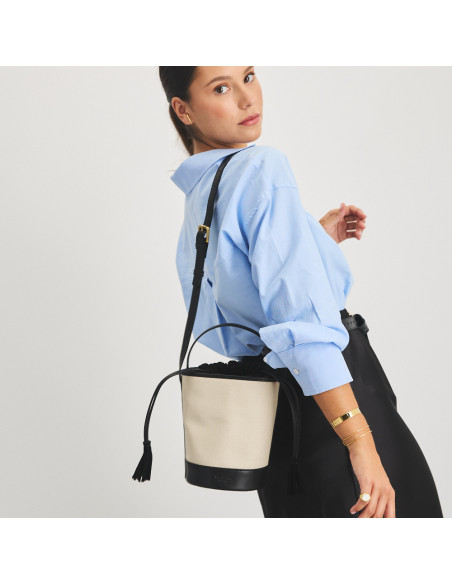 Small black canvas bucket bag worn over the shoulder - MONPIEL
