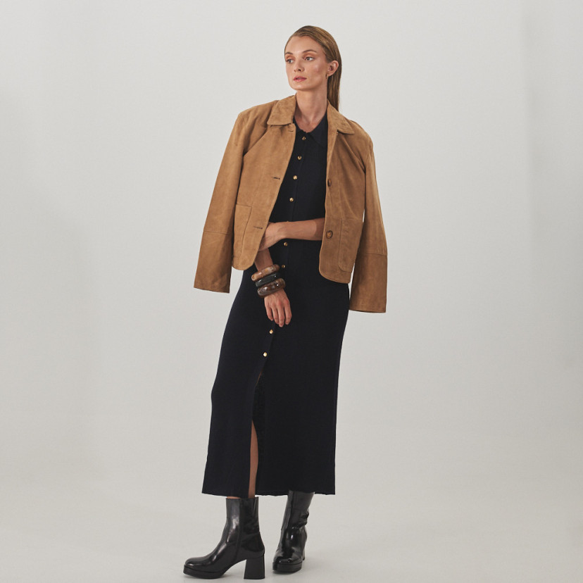 Camel leather women's jacket with stitching, full shot, draped over the shoulders, front view - MONPIEL