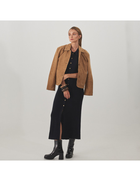 Claudia black patent leather platform boot, wide shot of model standing, wearing a leather jacket - MONPIEL Claudia black patent leather platform boot, wide shot of model standing, wearing a leather jacket - MONPIEL