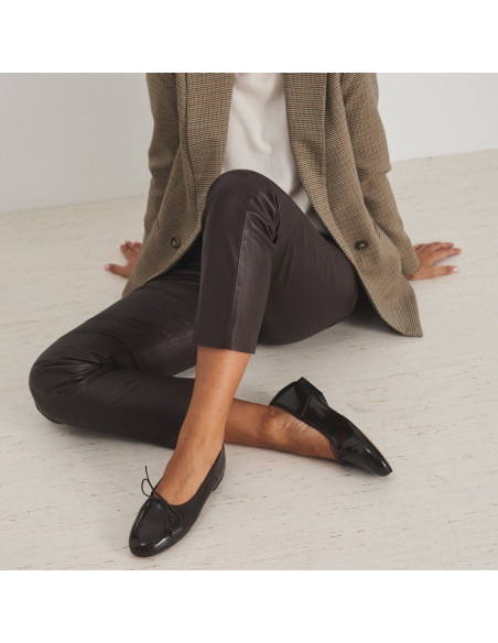 Brown patent leather high-cut ballet flat, perspective and profile view, model sitting on the floor - MONPIEL