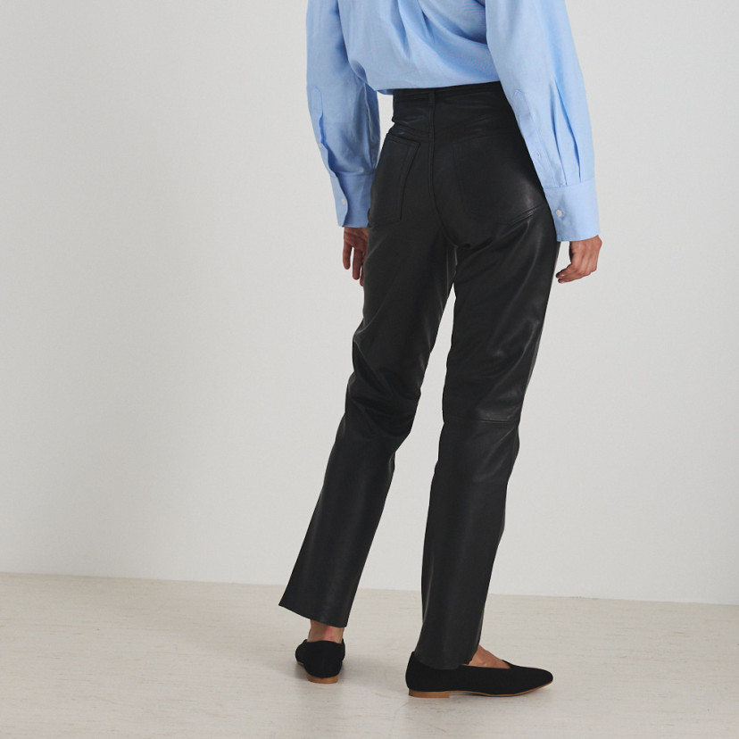 Black leather pants with rear view, medium shot - MONPIEL