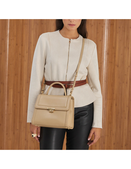 60's leather handbag for women in beige, hanging crossbody, perspective view, medium shot - MONPIEL 60's leather handbag for women in beige, hanging crossbody, perspective view, medium shot - MONPIEL