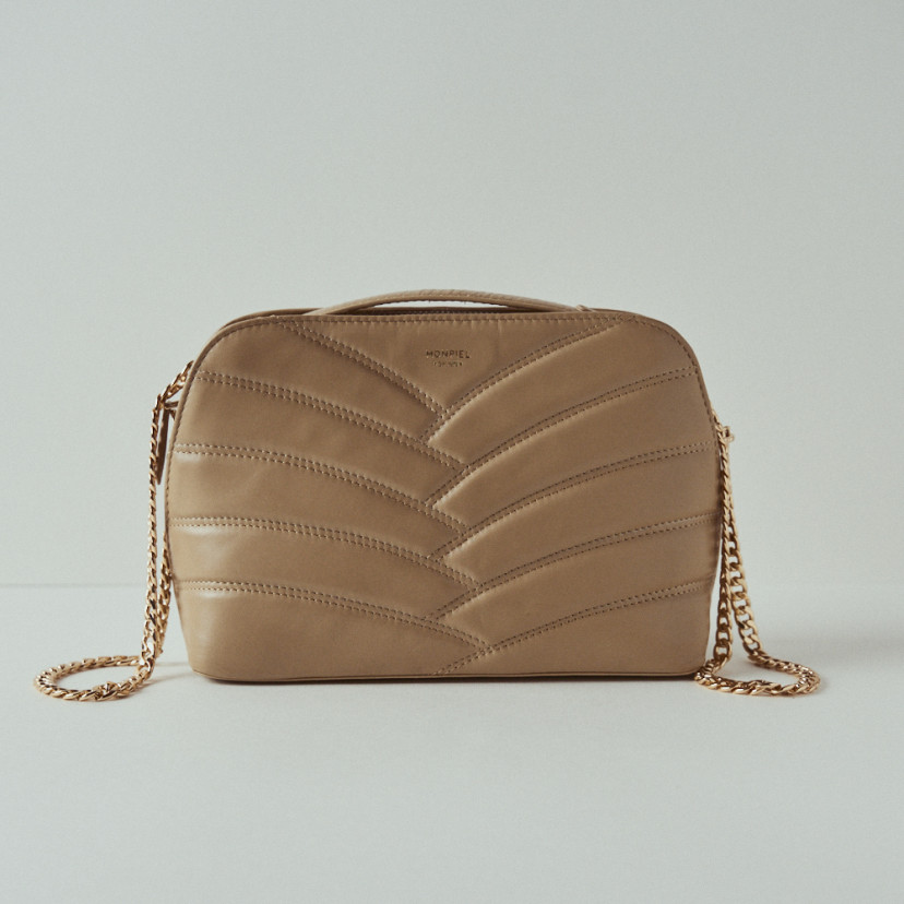 Quilted leather bag with gold chain in beige, front view with white background - MONPIEL