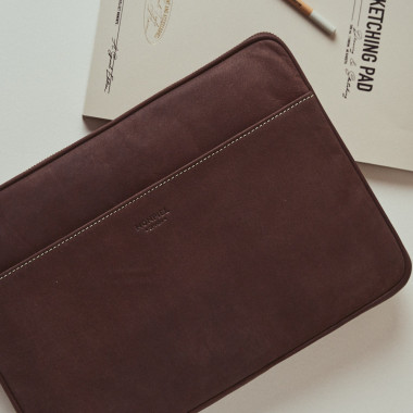 13" and 14"-inch leather laptop sleeve in tan, shown from the front on a white background - MONPIEL 2