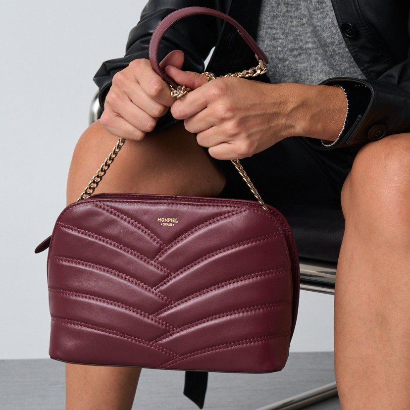 Gepolsterte Lederhandtasche mit...