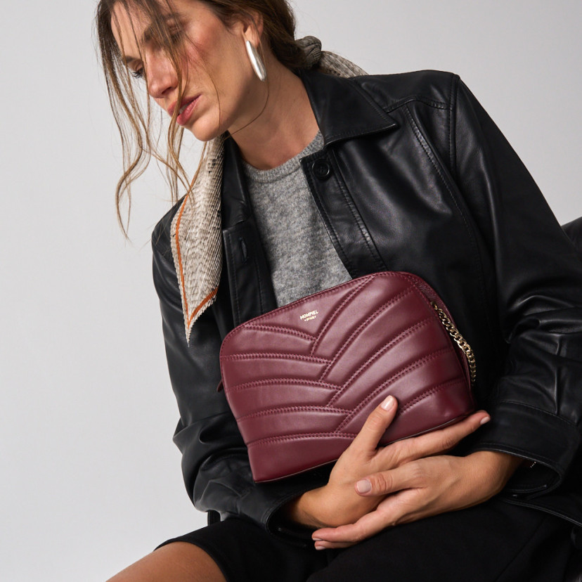 Gepolsterte Lederhandtasche mit...