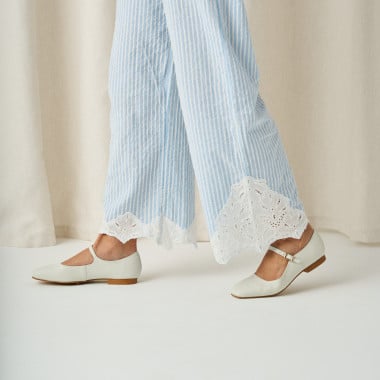 Carlota strap Mary Jane in ice color, side view, medium shot of steps - MONPIEL