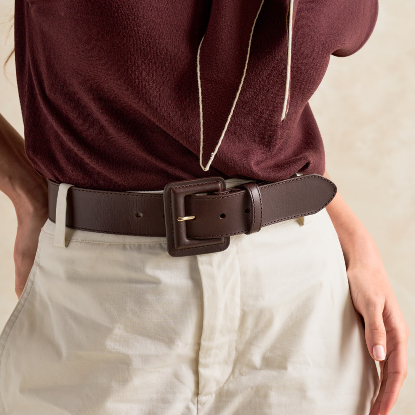 Wide leather belt with lined buckle