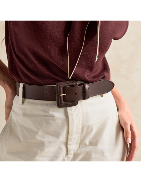 Wide leather belt with lined buckle