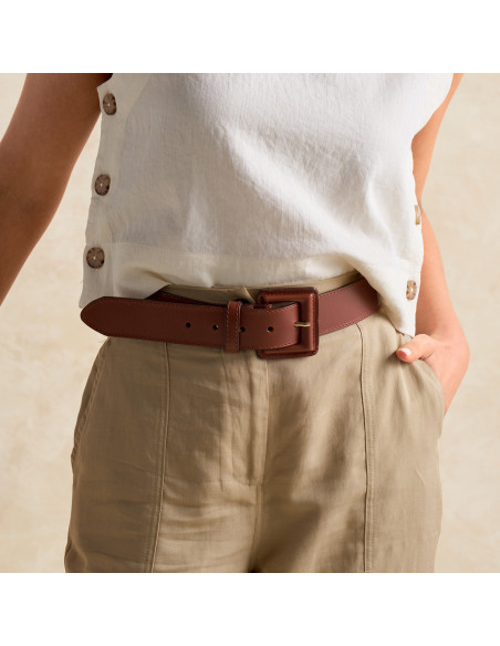 Wide leather belt with lined buckle