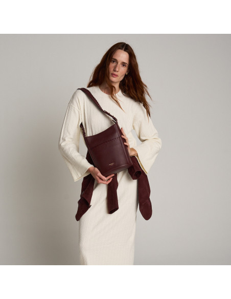 Borsa Champanera in pelle con tracolla e cuciture